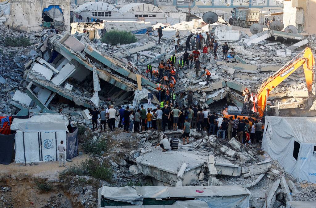 War-damaged building collapses in Gaza City