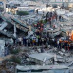 War-damaged building collapses in Gaza City