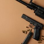 assault-rifle-with-handgun-on-brown-surface-2026-03-25-03-13-05-utc