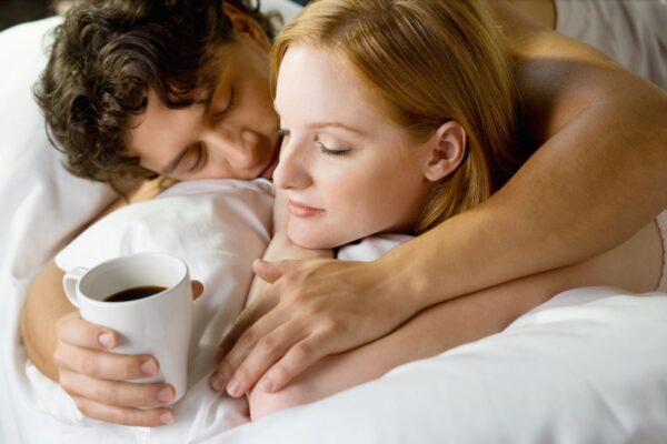 couple-embracing-in-bed-with-coffee-2026-01-05-23-33-01-utc